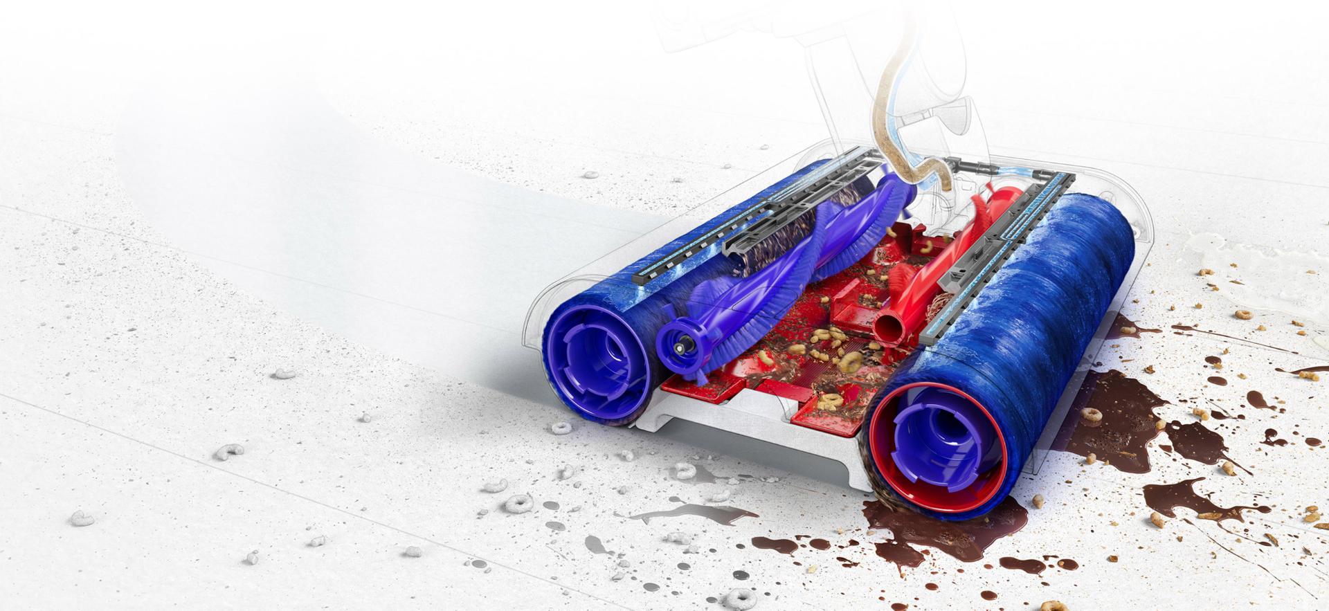 תמונת חתך של ראש הניקוי של Dyson WashG1 חושפת את הרולרים המיקרופייברים ופסי המברשת המשניים, בזמן שראש הניקוי מתמודד עם פסולת ונוזלי מטבח