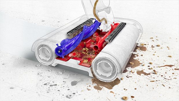 A cutaway revealing secondary rollers separating dry debris from the primary rollers