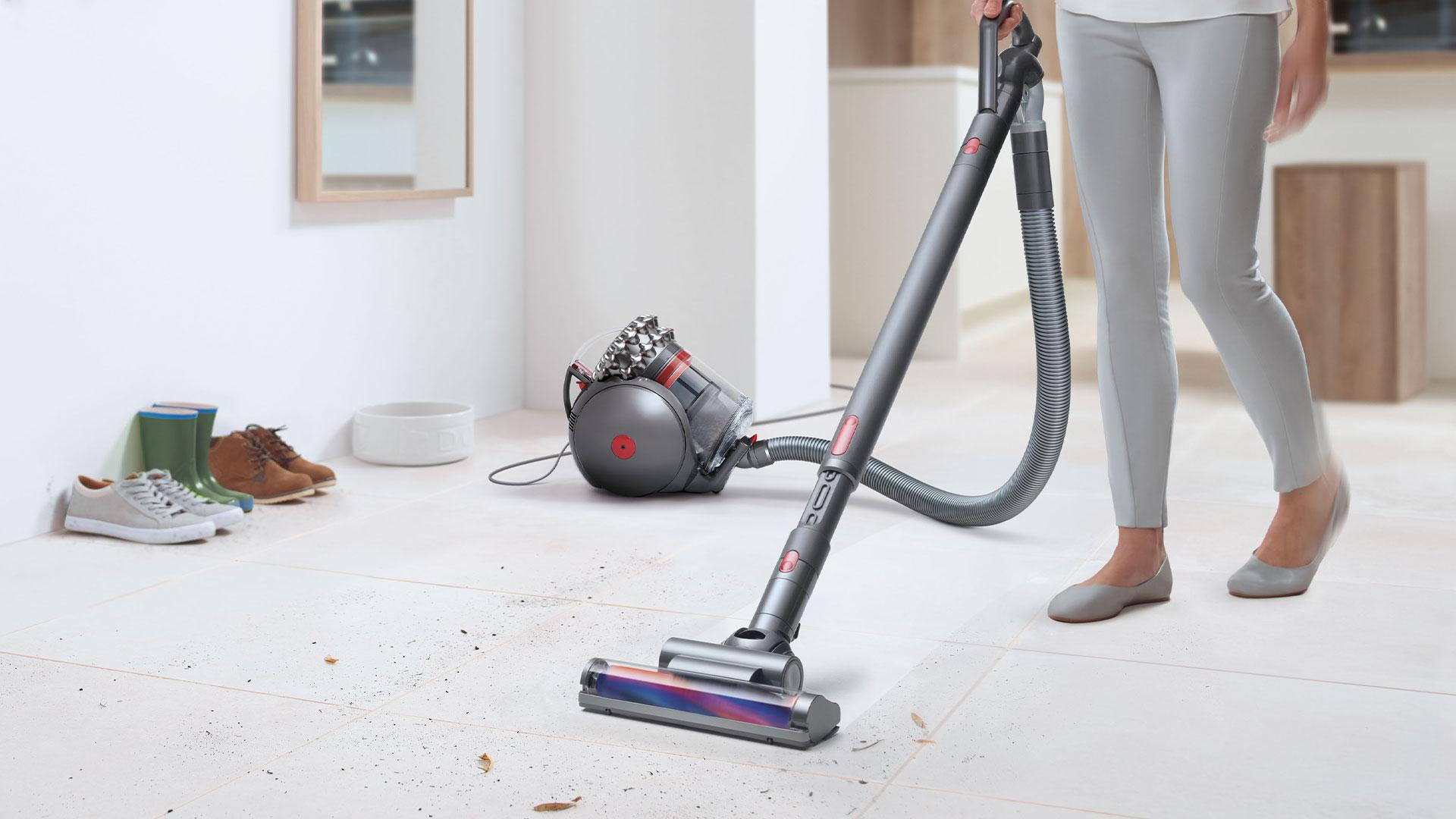 Dyson corded vacuum cleaner on tiles