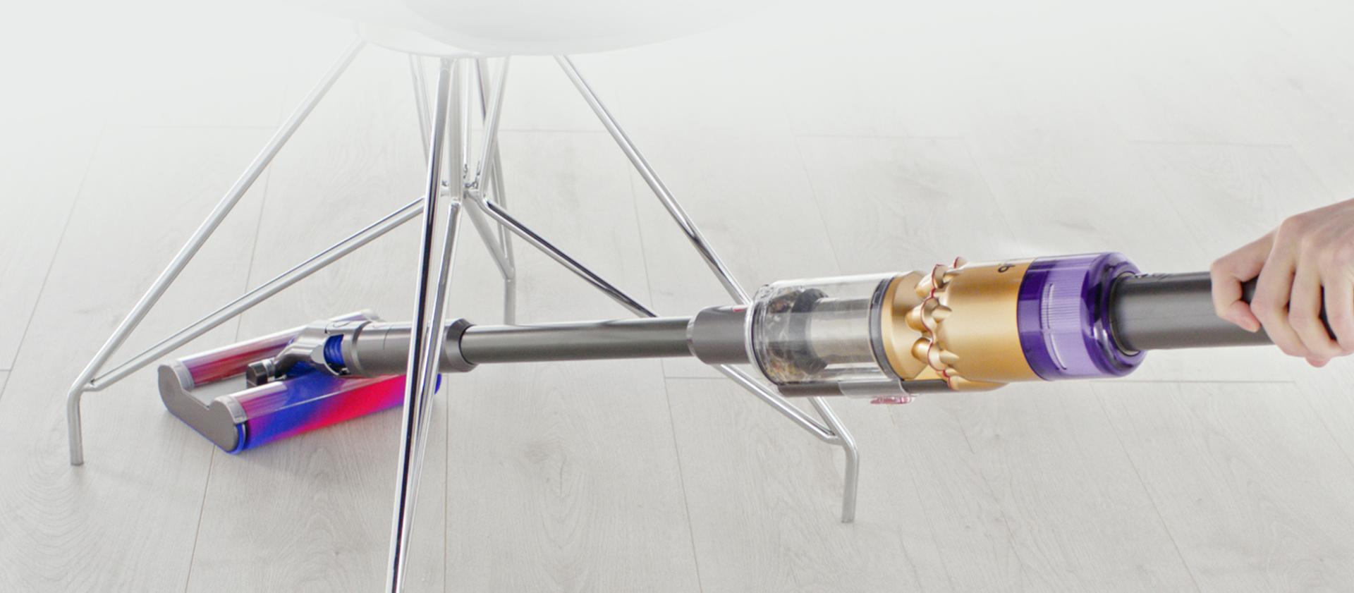 Video of Dyson Omni-glide™ vacuum manoeuvring around a table leg.