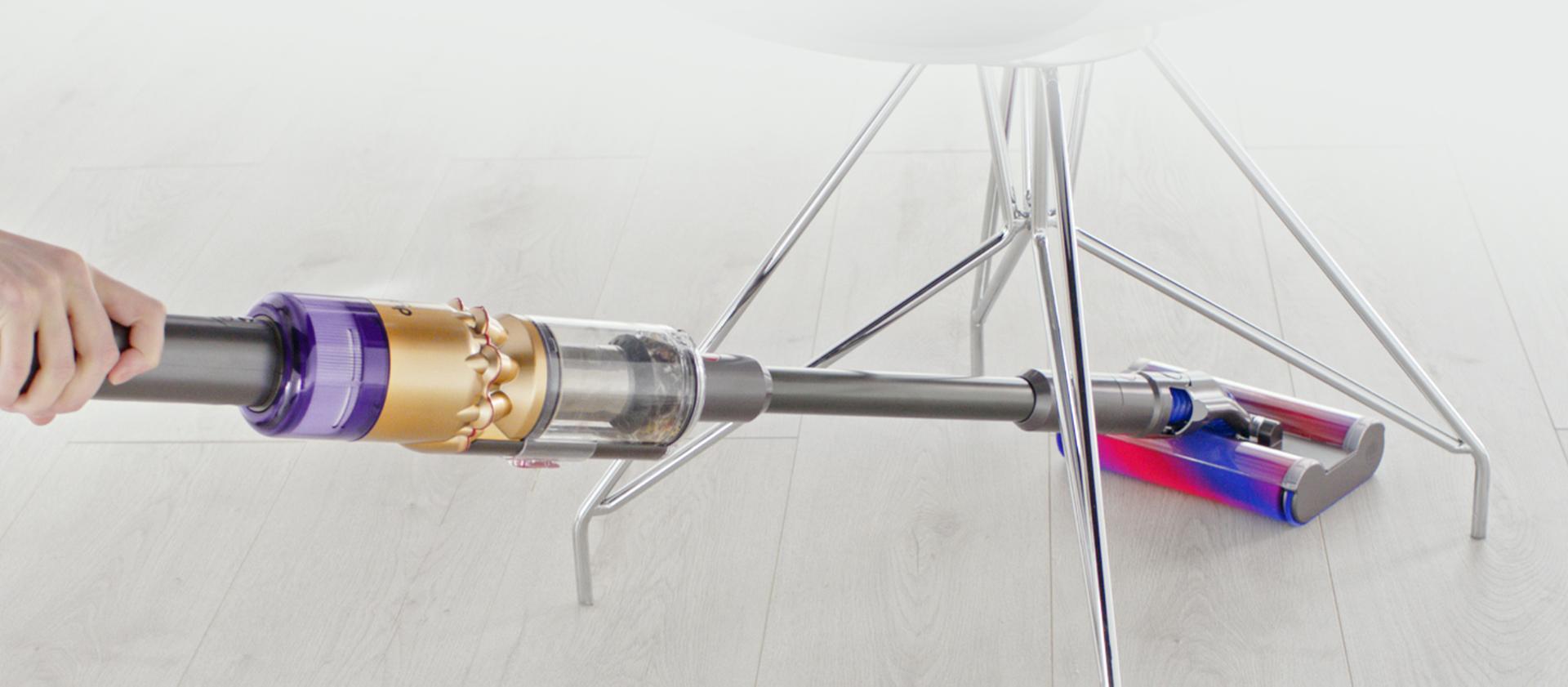 Video of Dyson Omni-glide™ vacuum manoeuvring around a table leg.