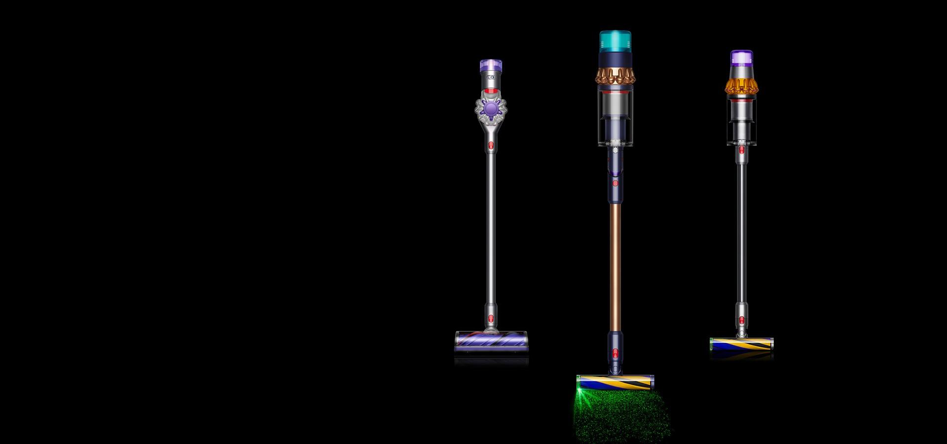 Three different Dyson vacuums shown front-on, in a row.