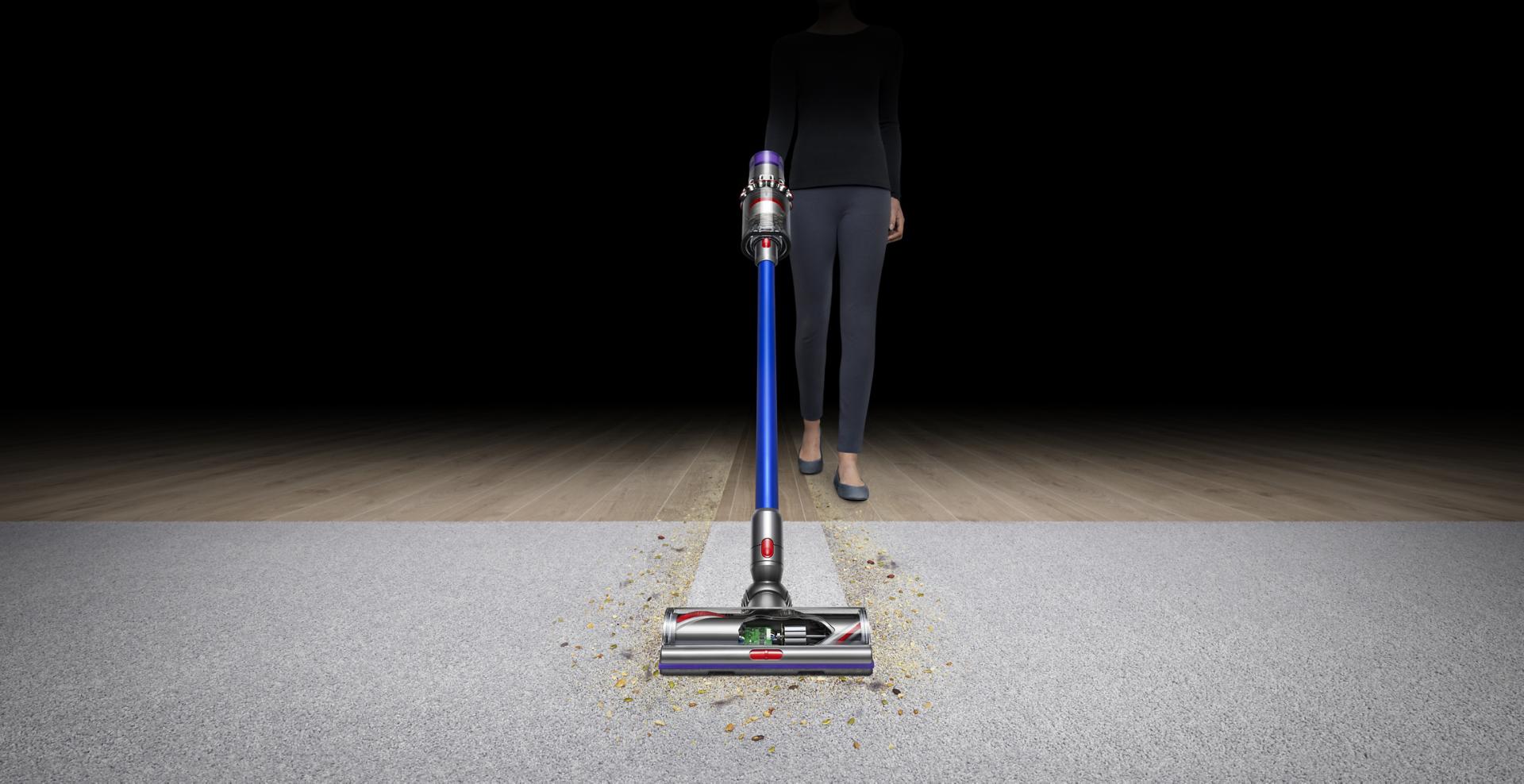 Front view of Dyson V11™ vacuum on carpet