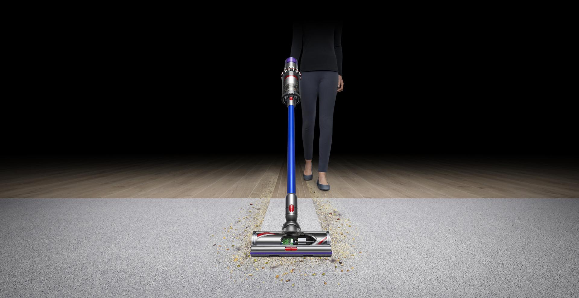 Front view of Dyson V11™ vacuum on carpet