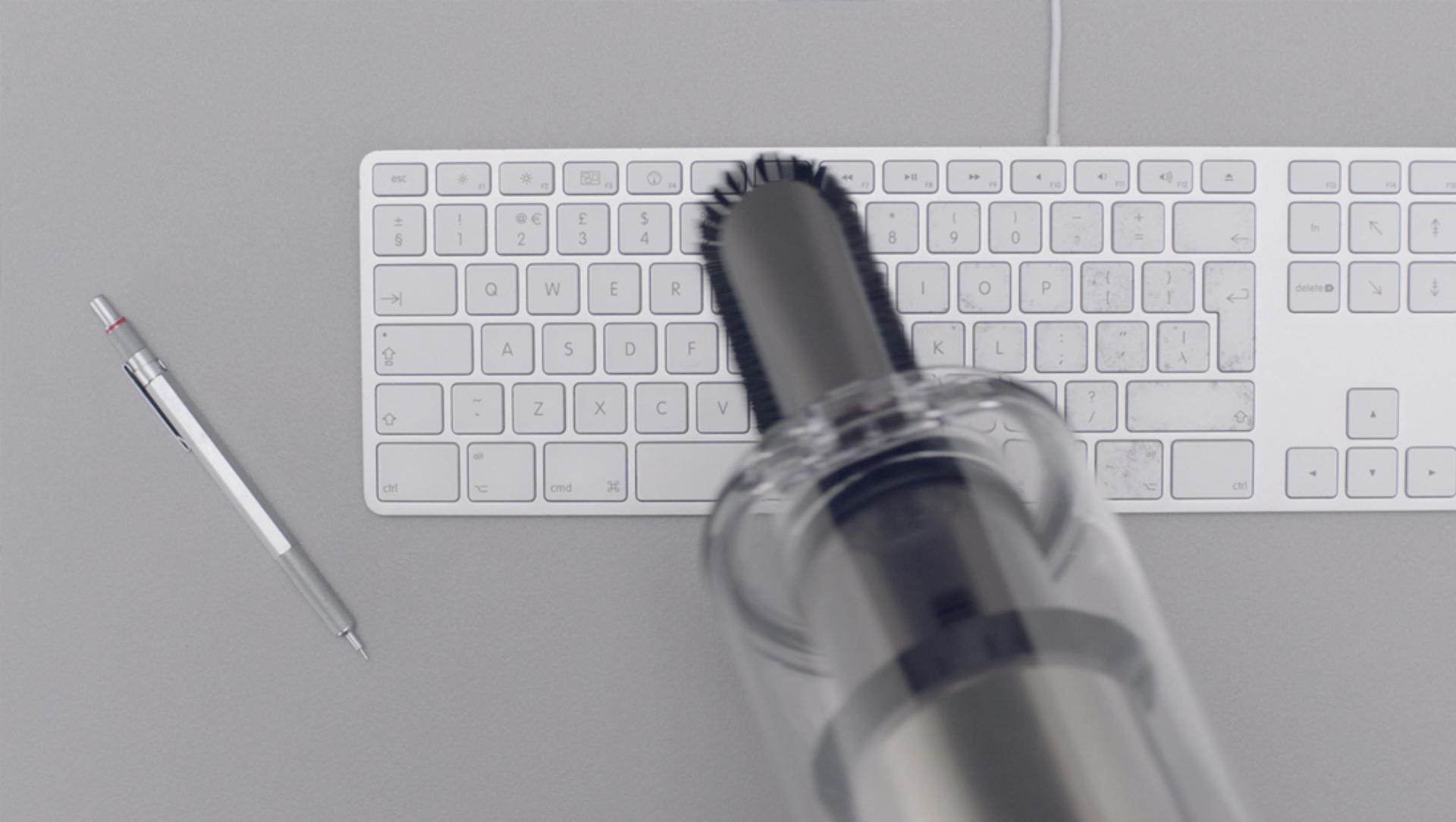 Soft dusting brush cleaning a keyboard