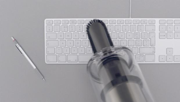 Soft dusting brush cleaning a keyboard