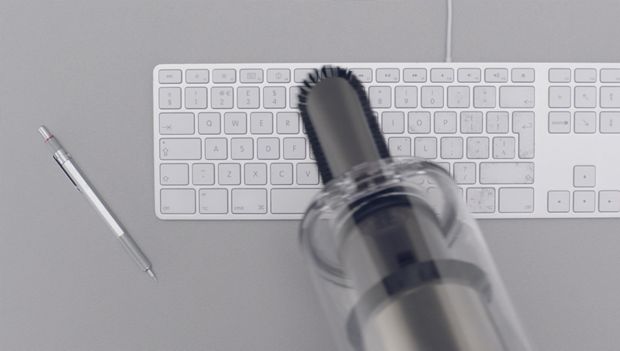 Soft dusting brush cleaning a keyboard 