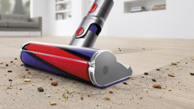 Person holding the Soft roller cleaner head