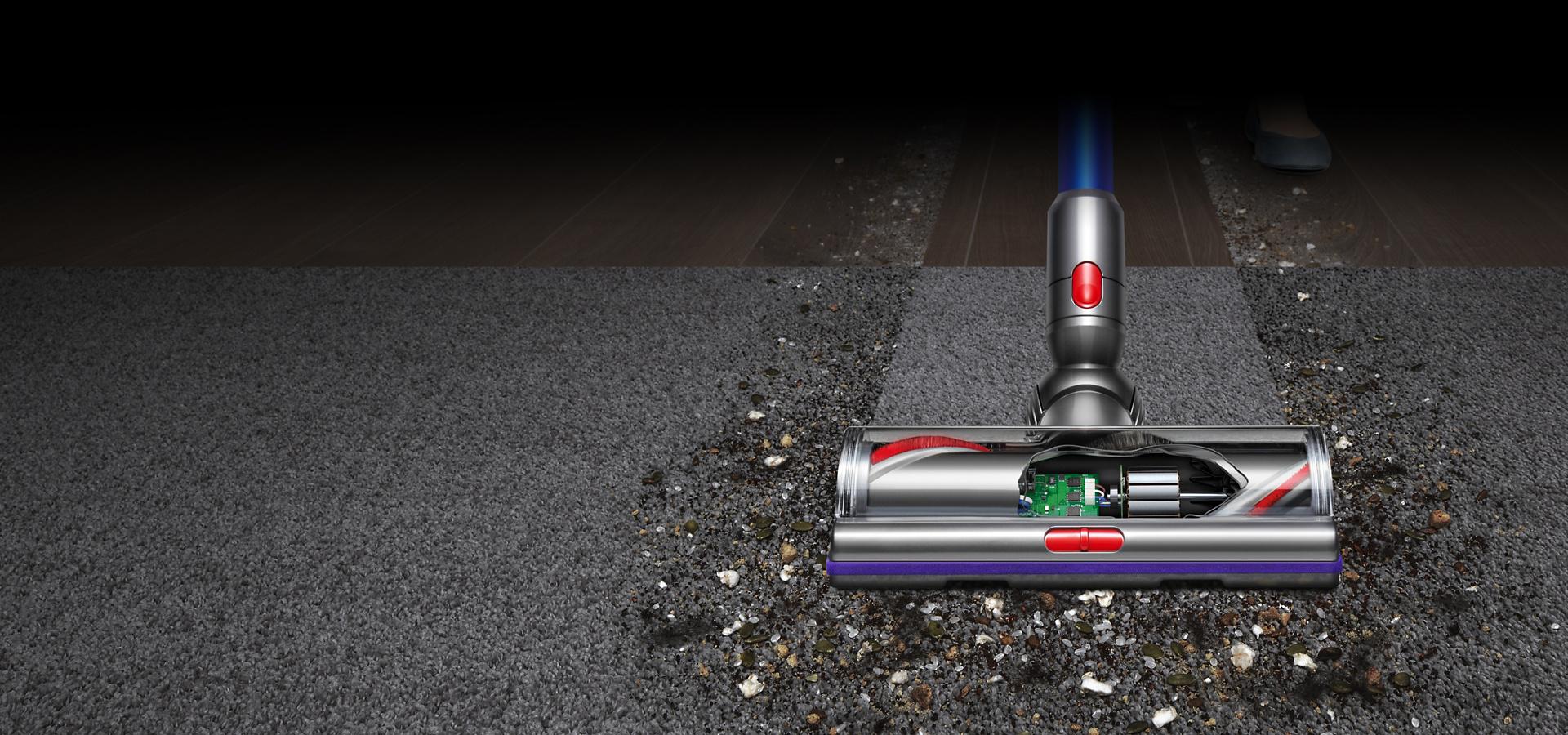 Dyson V11™ vacuum cleaner head moving from hard floor to carpet