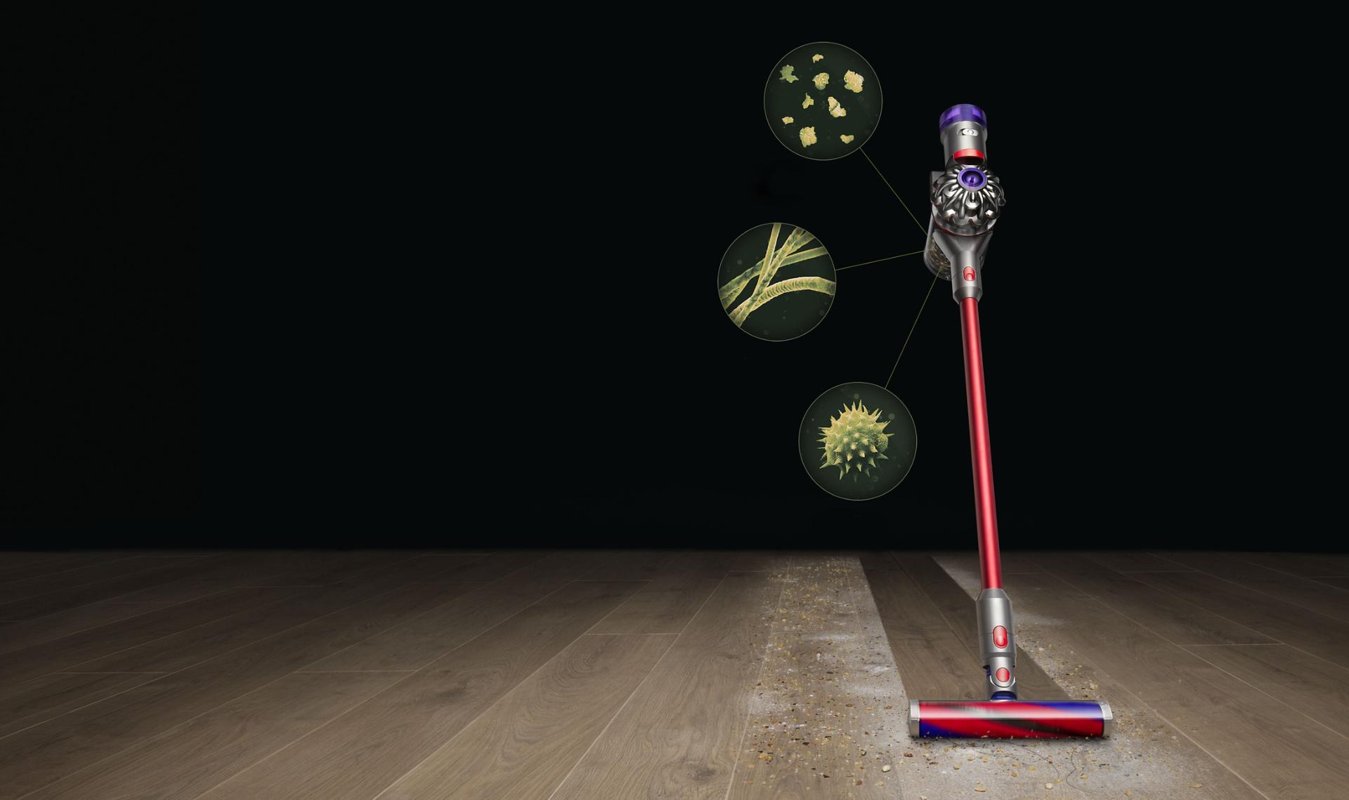 Dyson V8 Slim cleaning cleaning dust from a hard floor