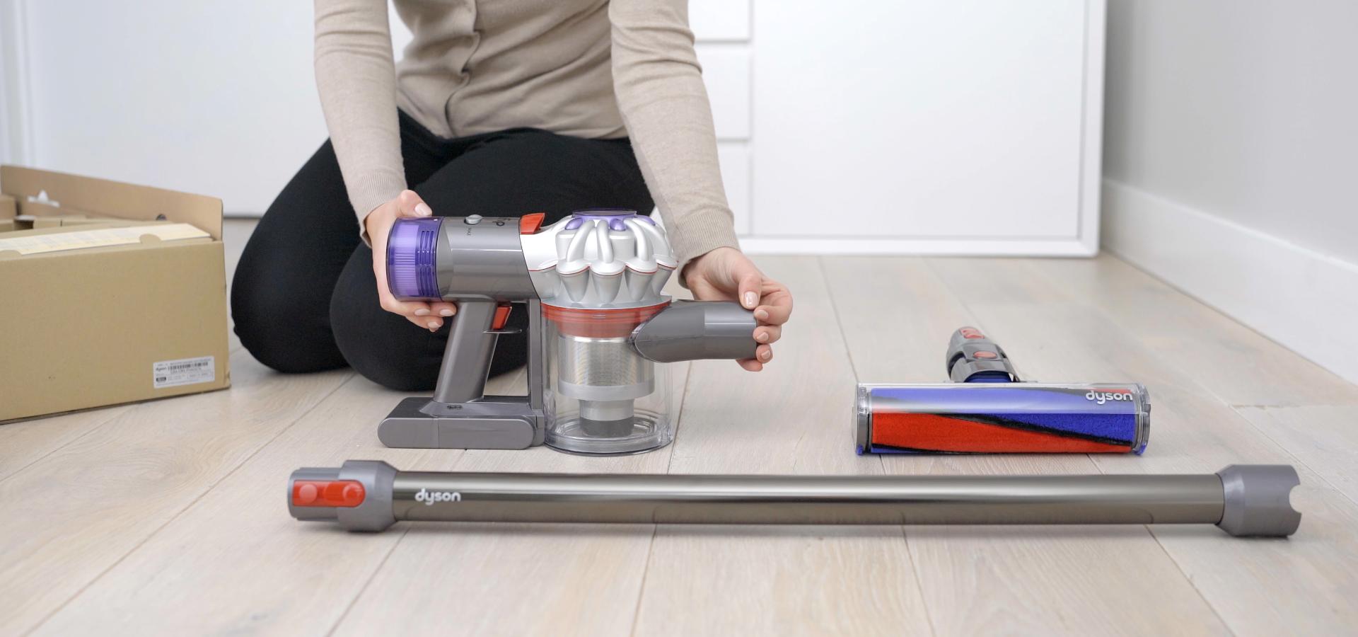 Dyson V8 vacuum being assembled.