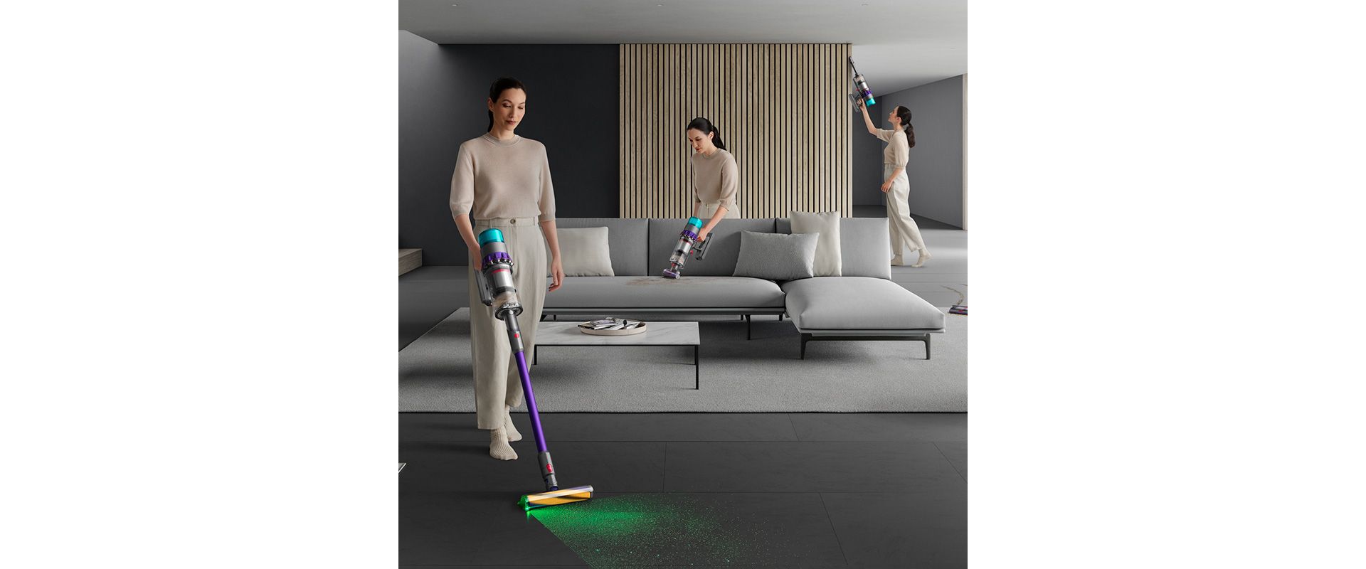Woman shown using the Dyson Gen5detect as a stick and handheld vacuum around the home.