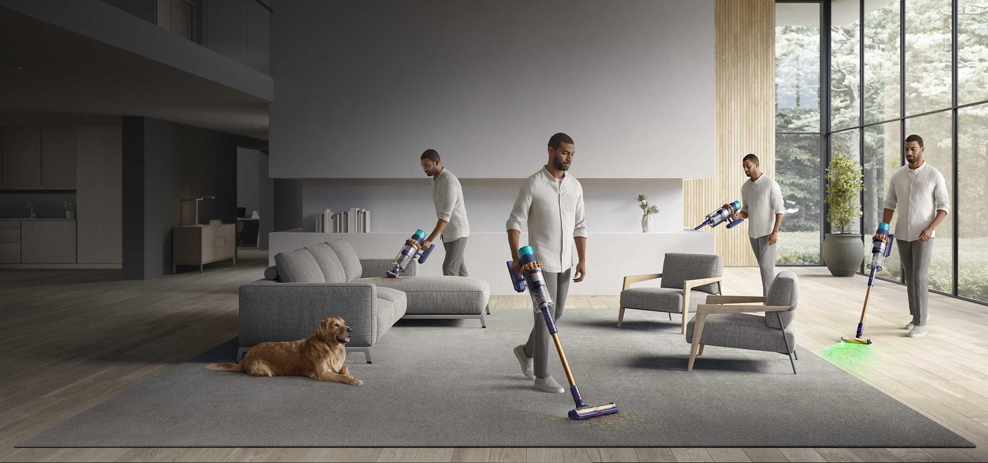Man demonstrating the versatility of Dyson Gen5outsize, cleaning with different cleaner heads and tools all around a living room.