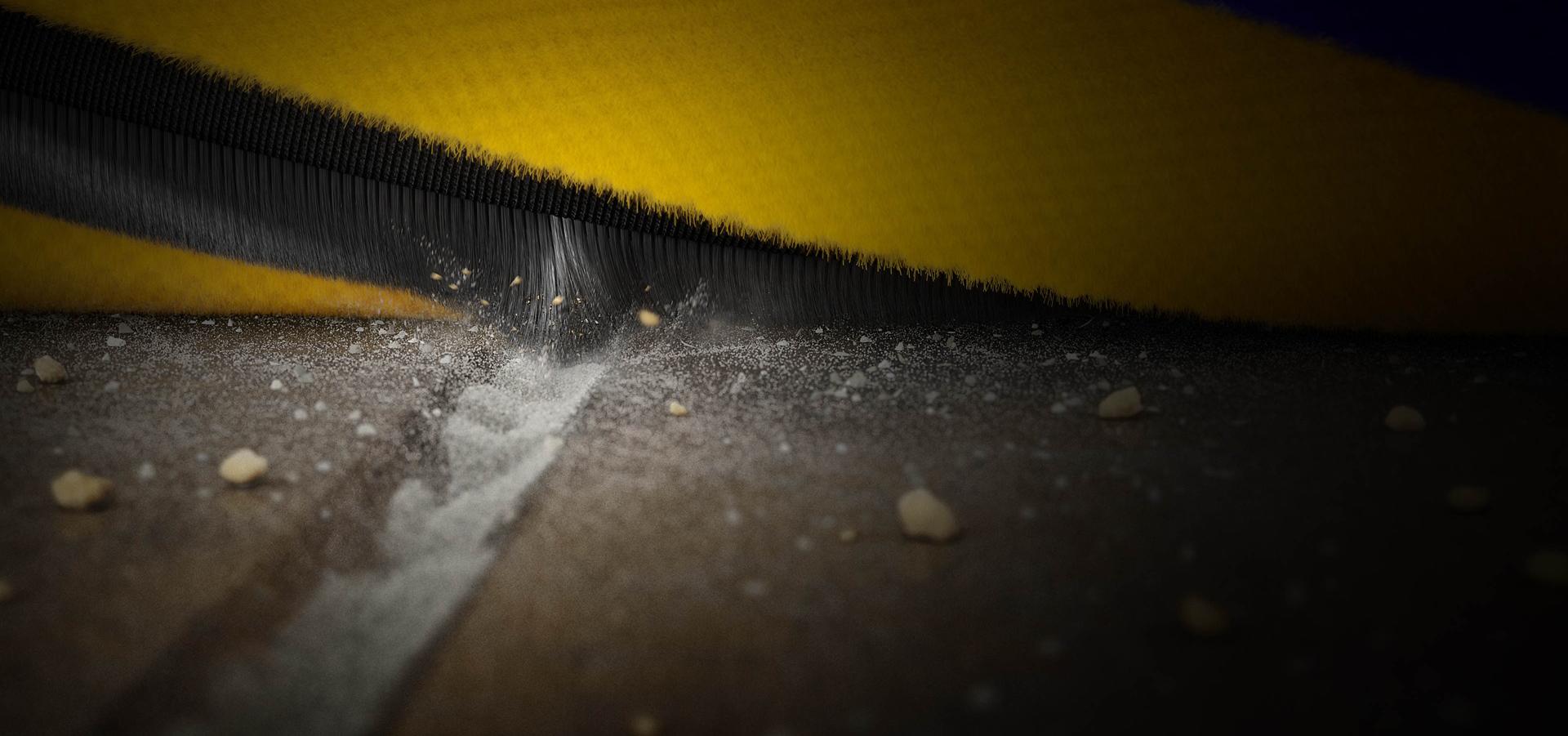 Close up of anti-static carbon fibre filaments cleaning statically charged particles from hard floors.