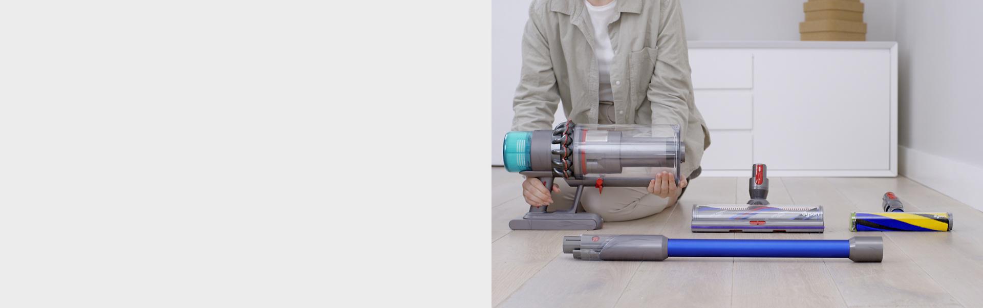 A woman assembling the Dyson Gen5outsize vacuum cleaner.