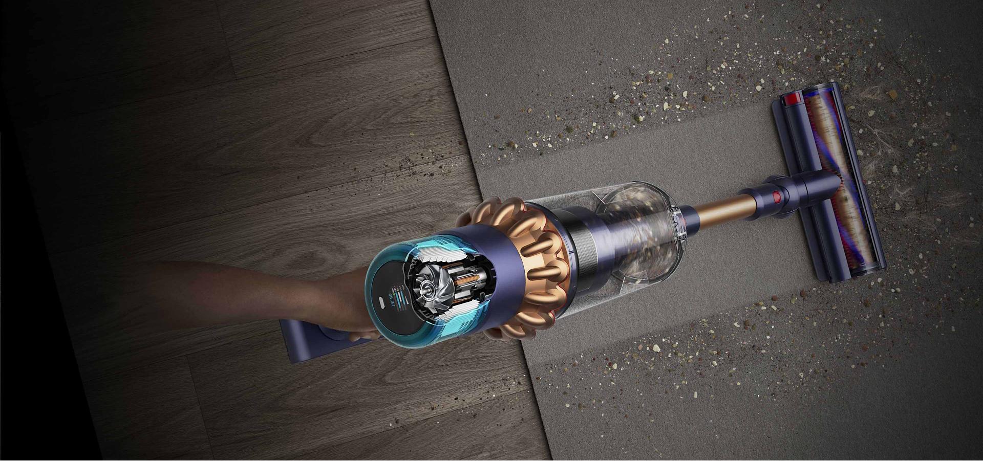 Dyson Gen5outsize shifting from a hard floor to a carpet.