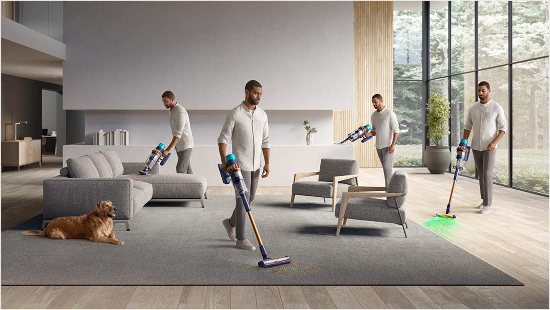 Man cleaning all around the room, on sofa, carpet and hard floor.