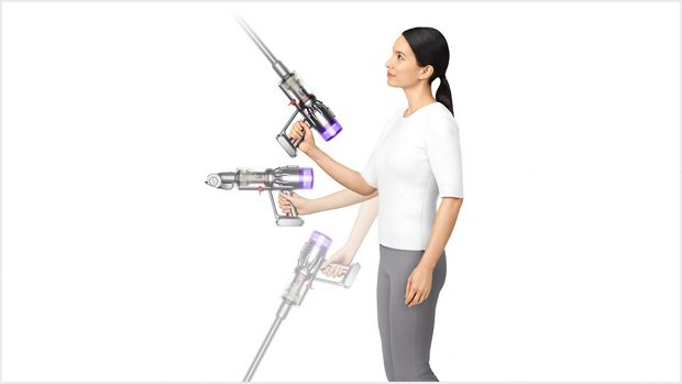 Woman using Dyson Micro 1.5kg vacuum up high and down low