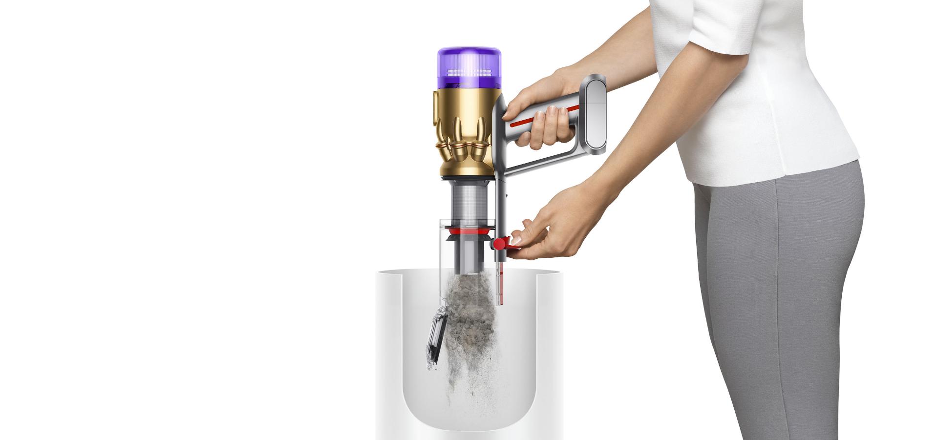 Dyson Micro 1,5 kg golit într-un coș de gunoi.