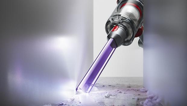 Dyson Micro 1.5kg vacuum cleaning a worktop.