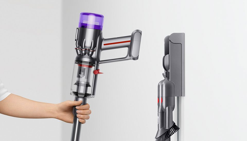 Placing the Dyson Micro 1.5kg™ vacuum in its wall dock