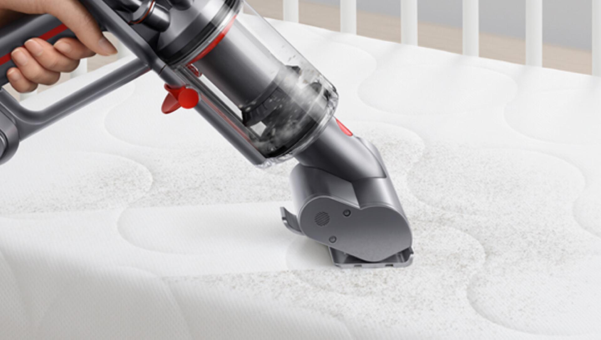 Dyson Micro 1.5kg™ vacuum cleaning a mattress