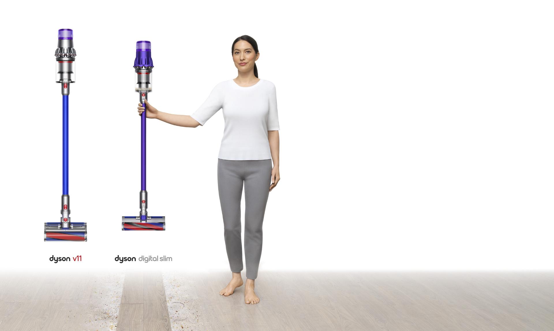 Image of a woman holding a Dyson Digital Slim™ vacuum alongside a V11™.