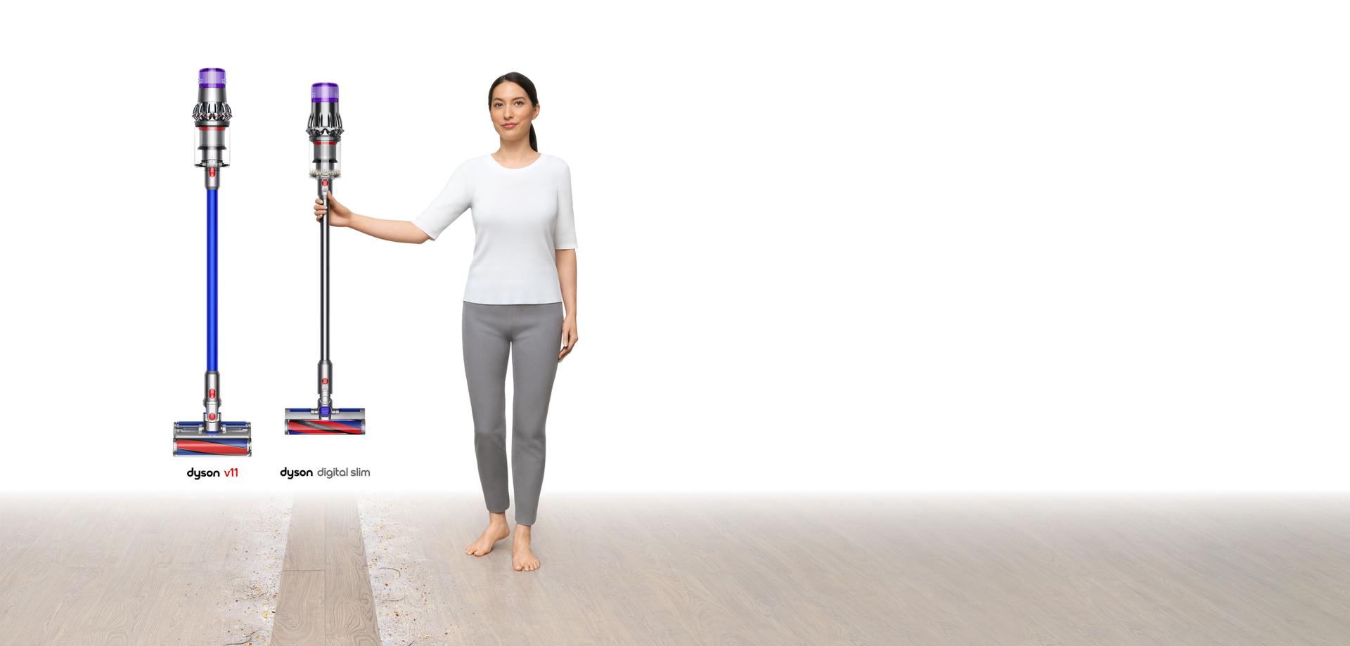 Image of a woman holding a Dyson Digital Slim™ vacuum alongside a V11™.