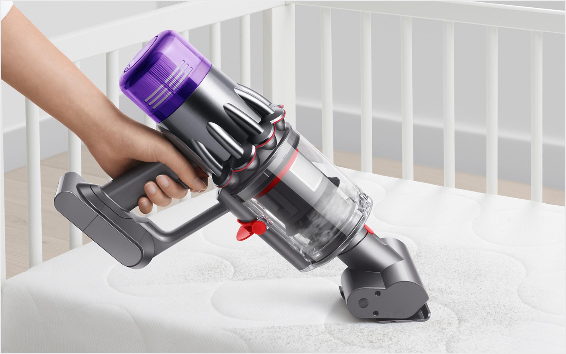 Picture of the mattress tool cleaning a futon.