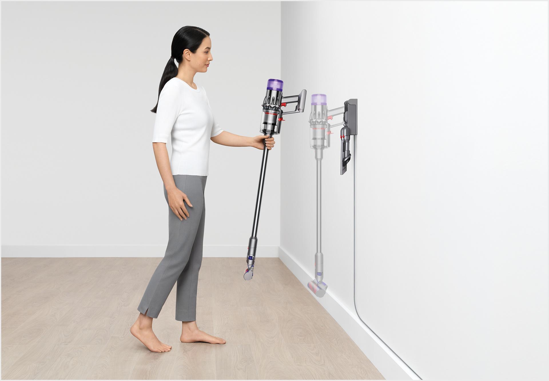 Dyson Digital Slim™ vacuum being placed into wall dock.