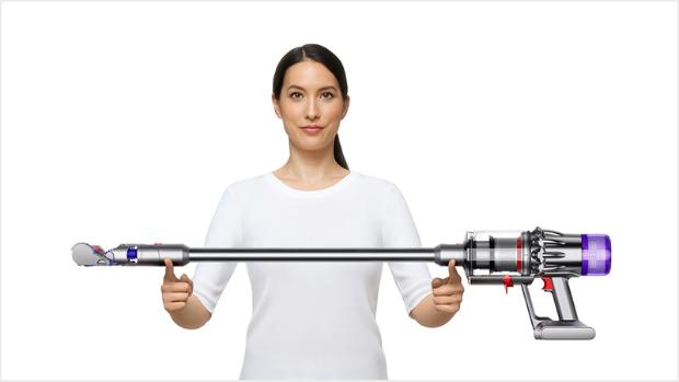Woman lifting the Dyson Digital Slim vacuum
