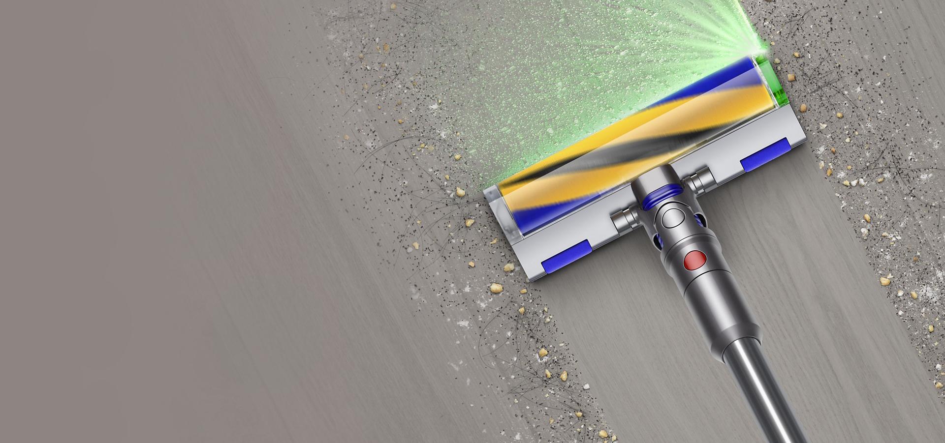 Fluffy Optic cleaner head sucking up dirt to leave a clean path on a hard floor.