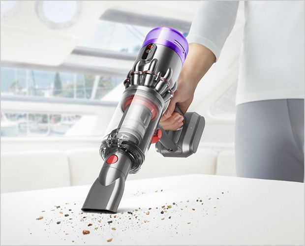 Dyson Micro vacuum cleaning a worktop.
