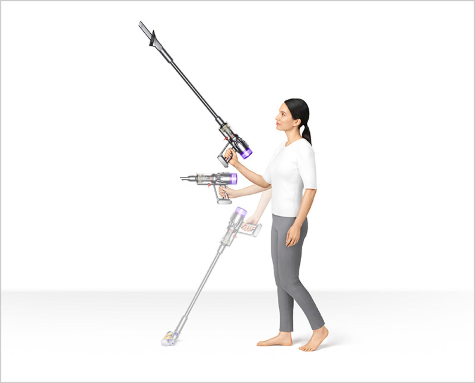 Woman using Dyson Micro vacuum up high and down low