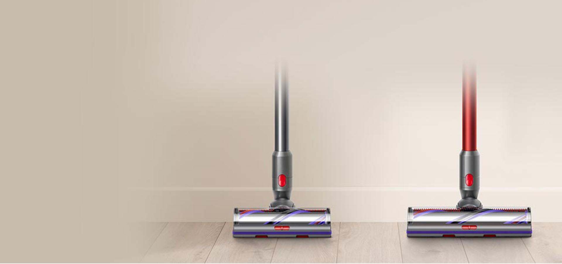 Image of Dyson V11 Absolute Extra next to Dyson Outsize showing differences in cleaner head size
