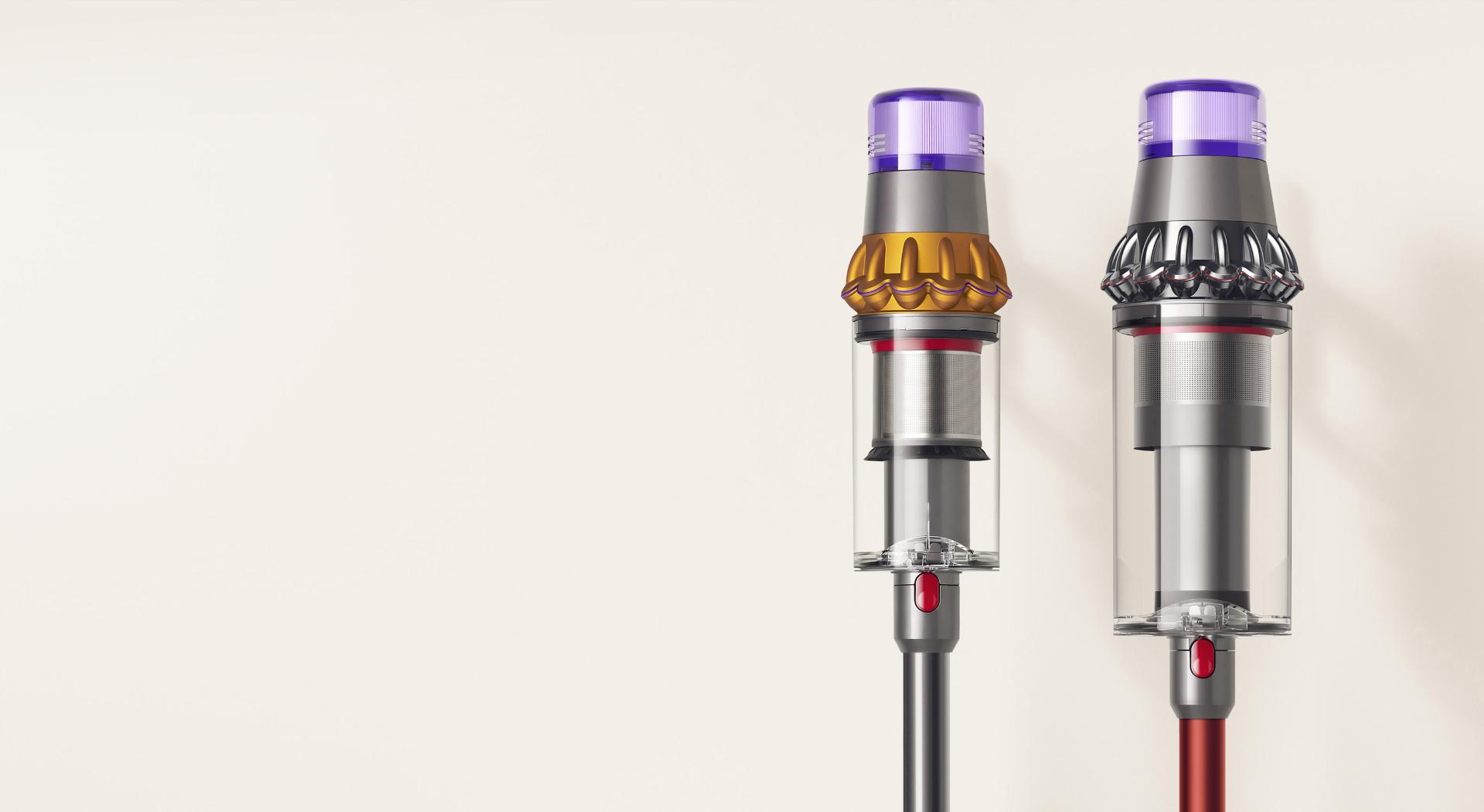 Dyson Outsize vacuum with 150% bigger bin next to a Dyson V11 Absolute vacuum bin