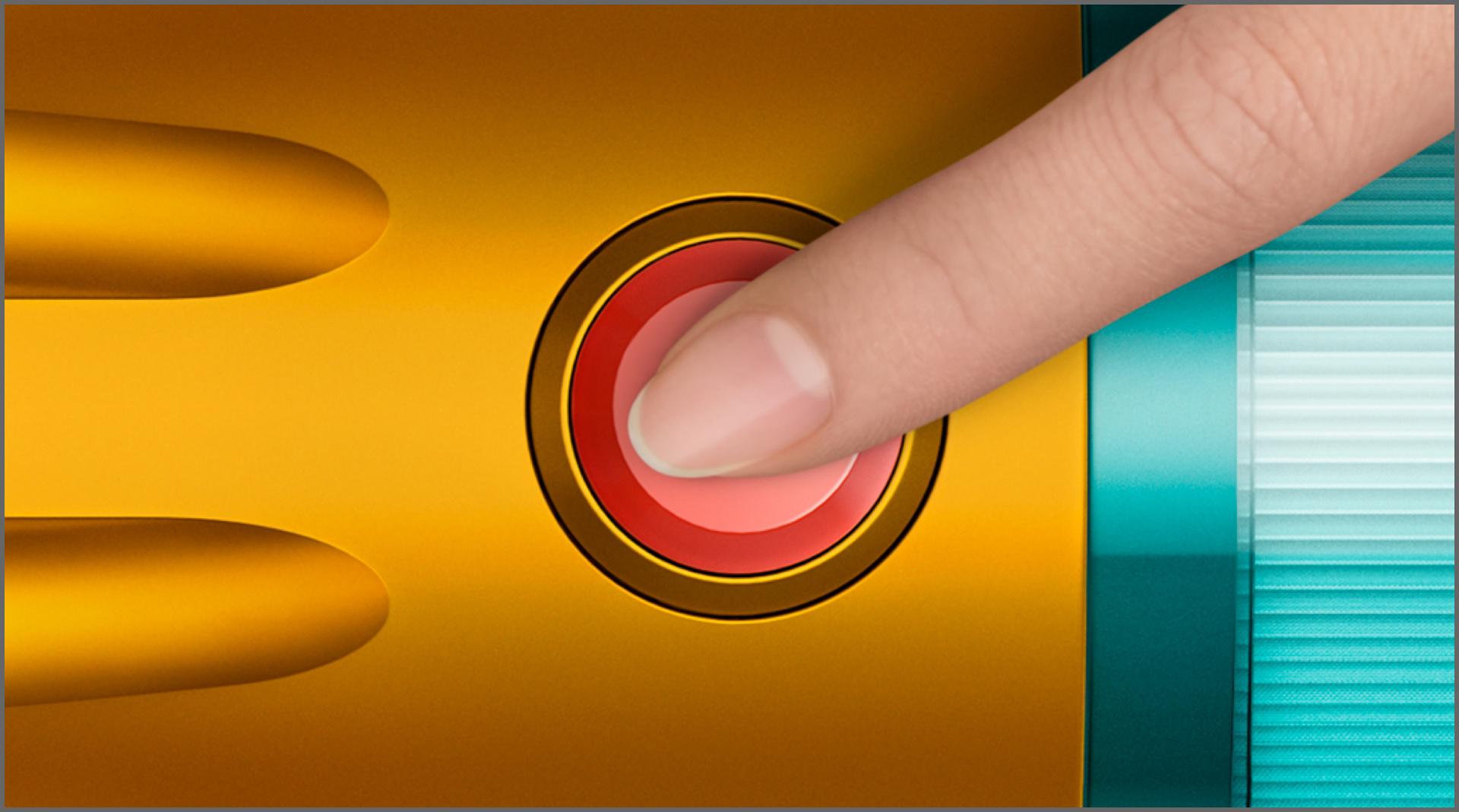 Close-up of the vacuum's power button