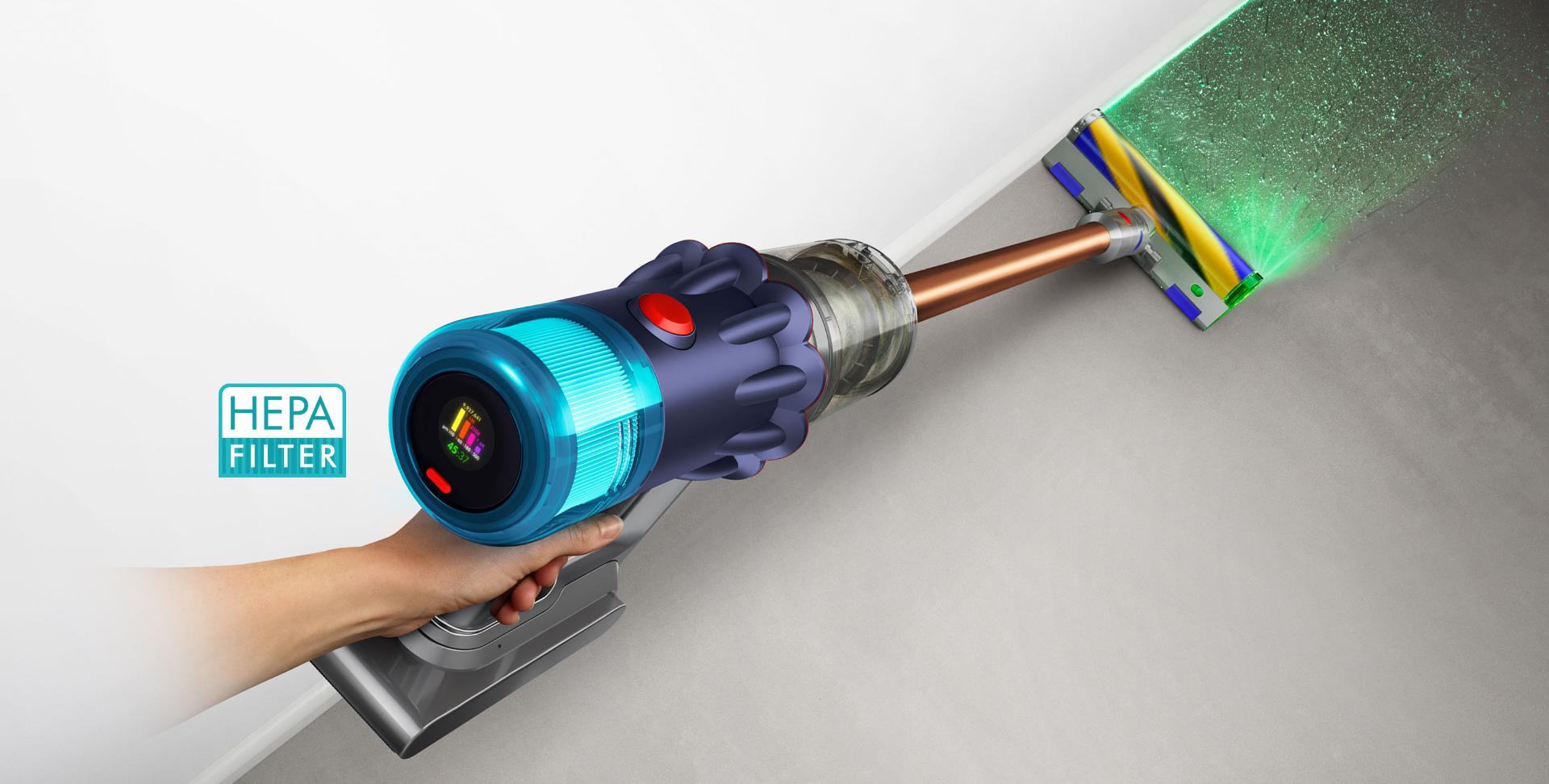 Close-up of hand holding the Dyson V12 Detect Slim vacuum