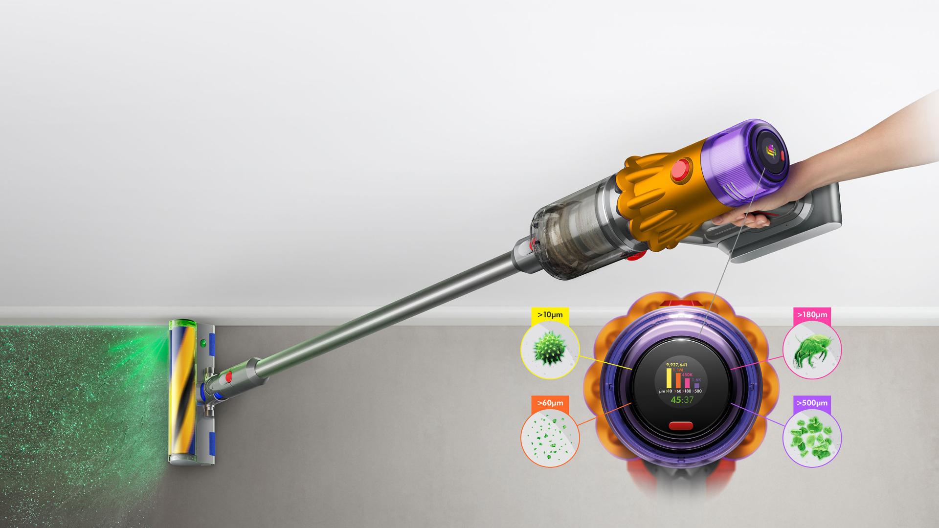 Dyson V12 Detect with a Fluffy Optic cleaner head illuminating a hard floor.