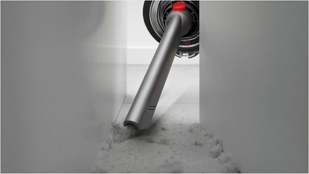 Crevice tool reaching into a tricky space.