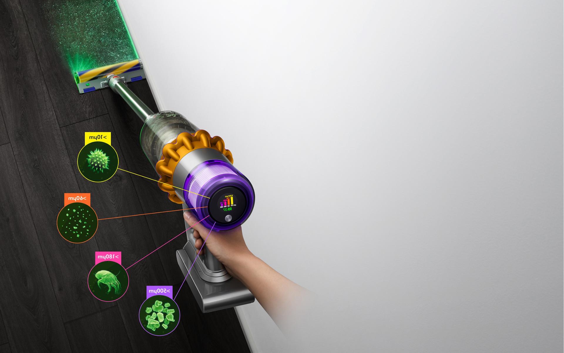 Dyson V15 Detect vacuum with Laser Slim Fluffy cleaner head, showing sizes of dust detected