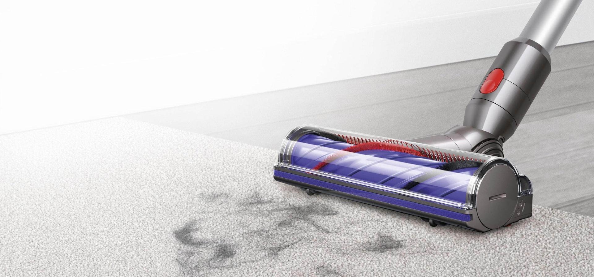 Motorbar cleaner head vacuuming pet hair from a carpet