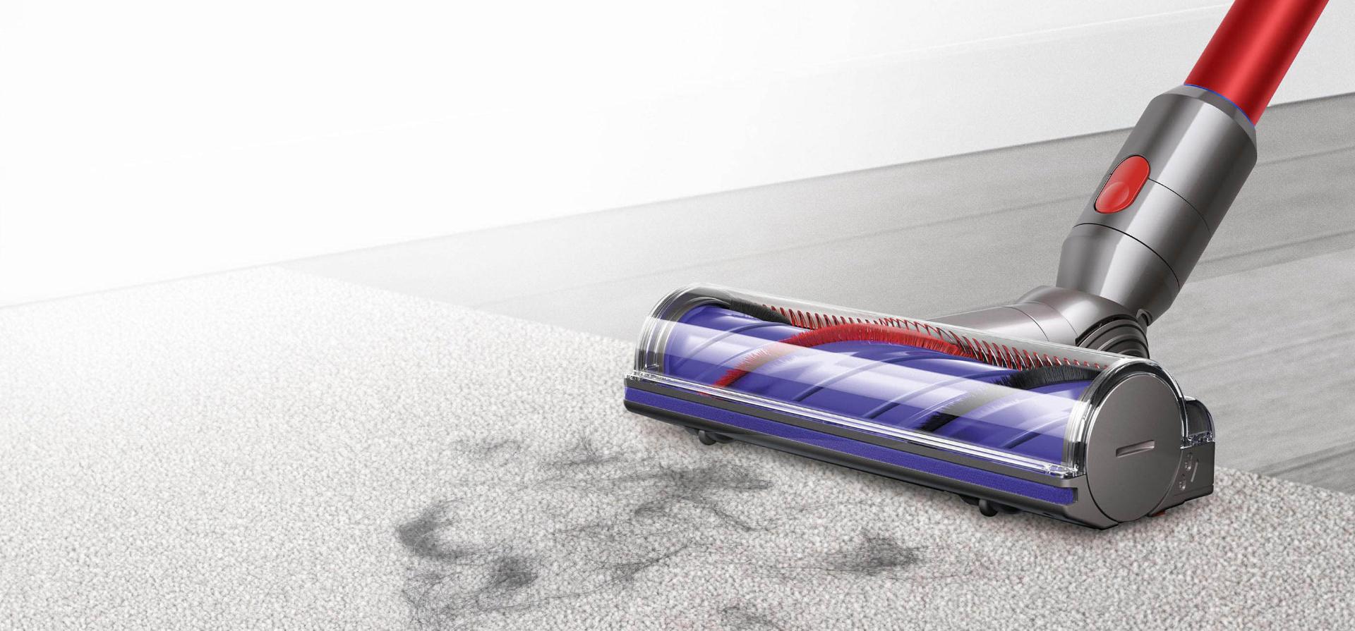 Motorbar cleaner head vacuuming pet hair from a carpet