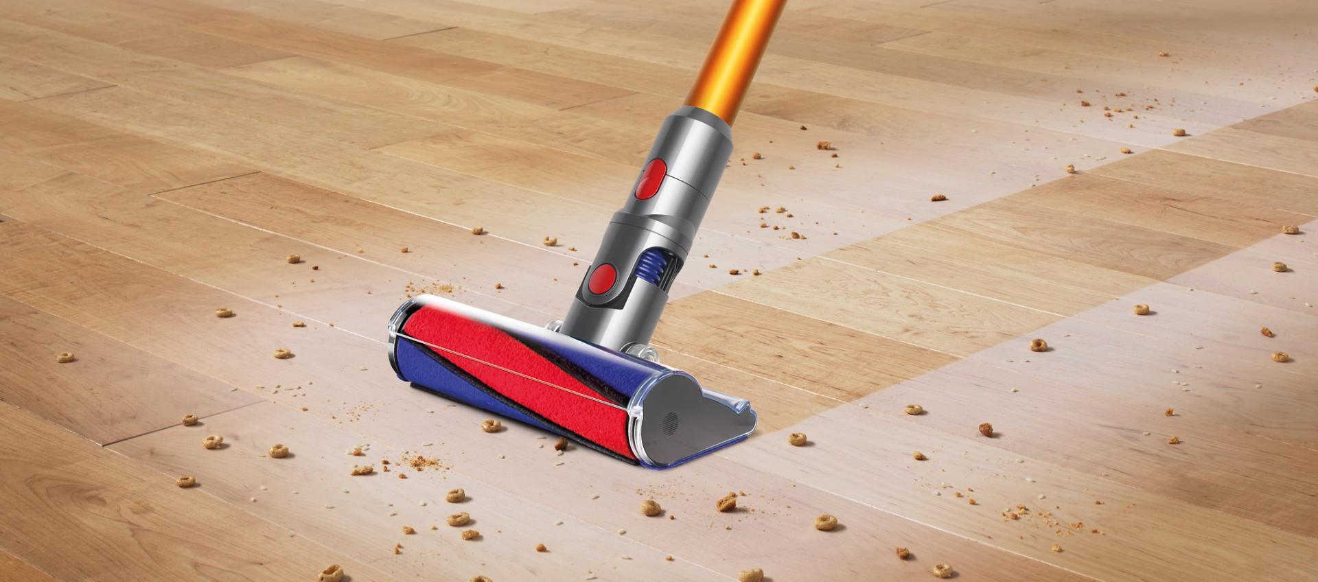 Two Dyson V8 vacuum cleaners cleaning side by side on carpet and hard floor