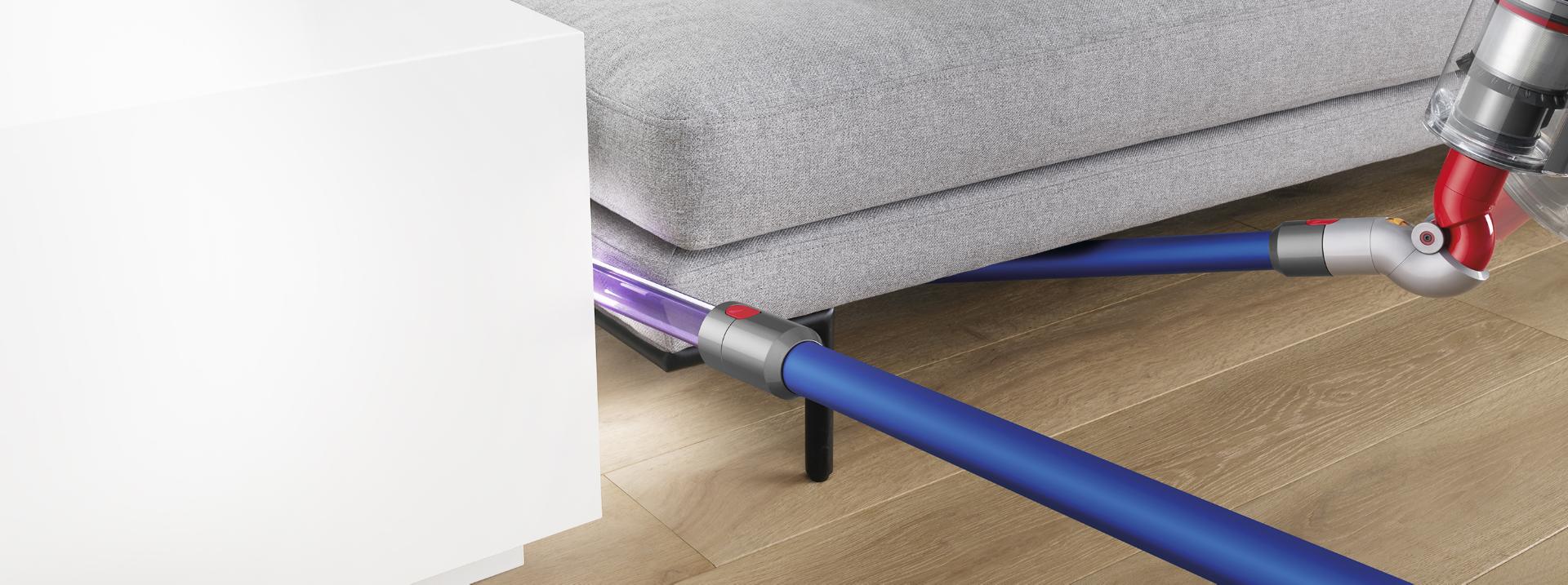 Dyson vacuum accessories cleaning a sofa