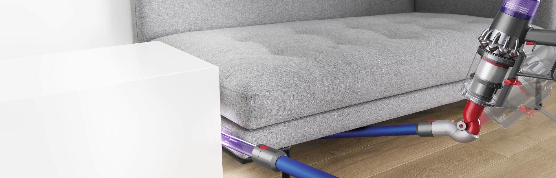 Dyson vacuum accessories cleaning a sofa