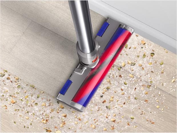 Slim fluffy cleaner head picks up debris from hard floor