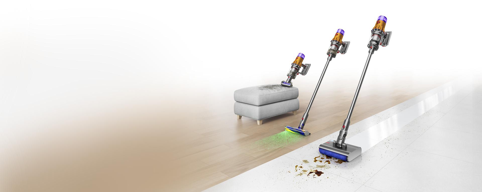 Three Dyson vacuums with three different cleaner heads attached. 
