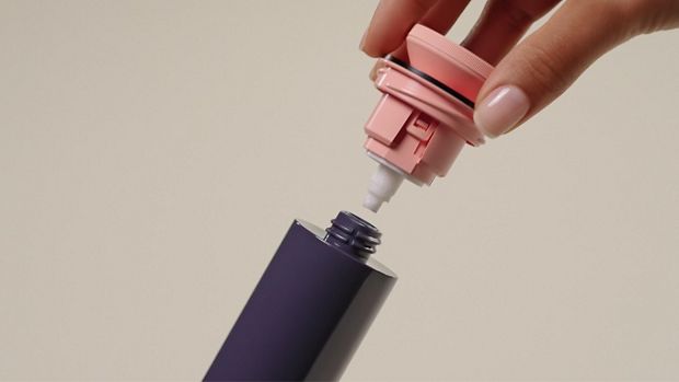 Removing the reusable pump from the outer sleeve.