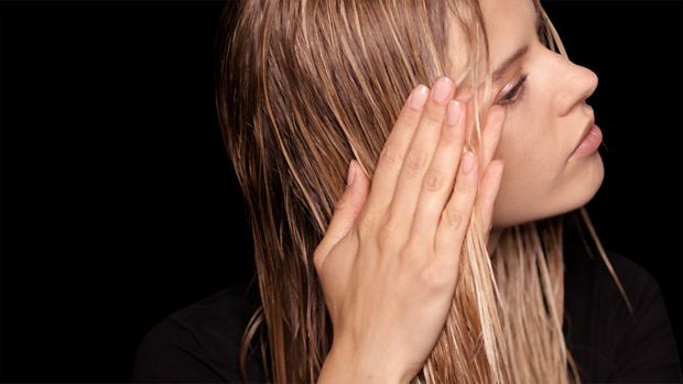 Applying Dyson Chitosan Pre-style cream